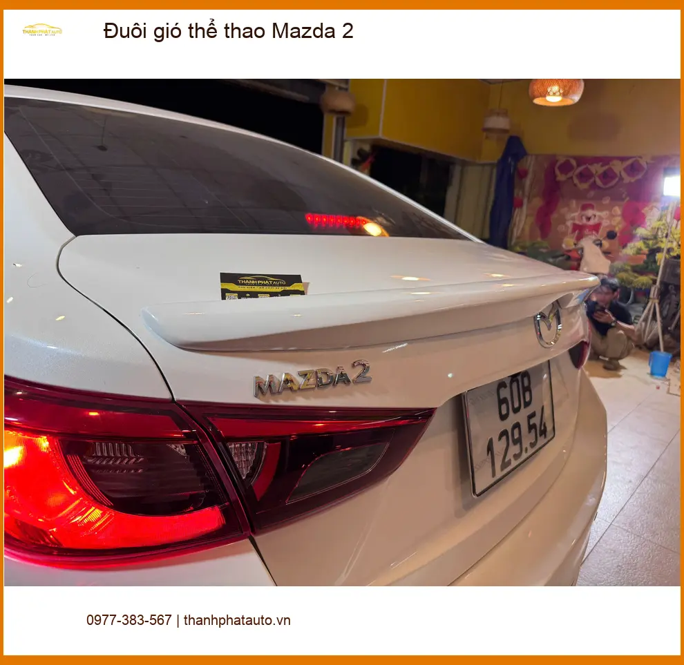 Anh Minh lắp đuôi gió thể thao Mazda 2 tại Thủ Đức để tăng vẻ cá tính cho xe ảnh thực tế 4