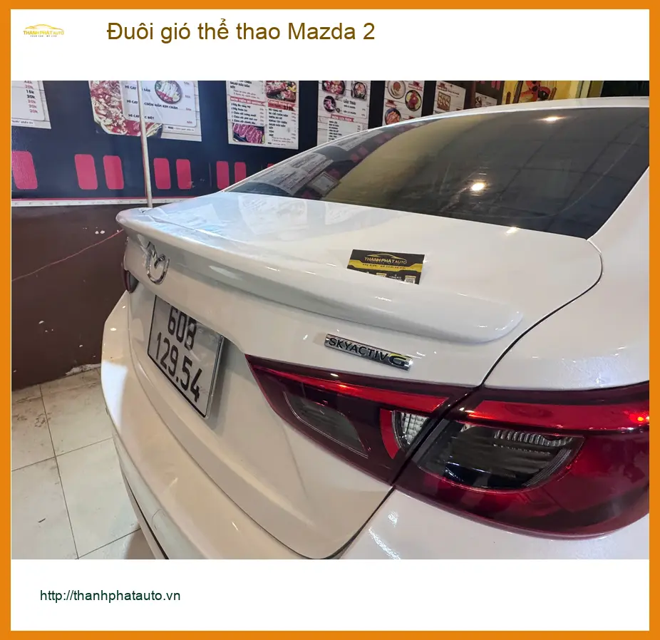 Anh Minh lắp đuôi gió thể thao Mazda 2 tại Thủ Đức để tăng vẻ cá tính cho xe ảnh thực tế 5
