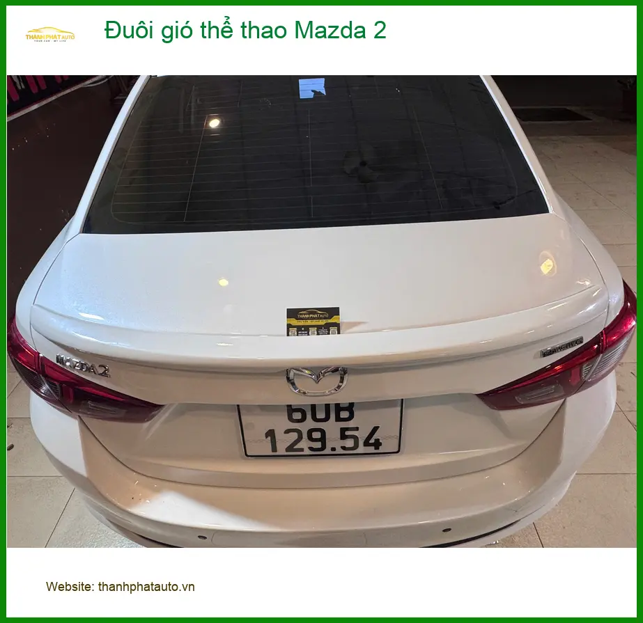 Chị Hoa lắp đuôi gió thể thao cho Mazda 2 tại Quận 5 tăng vẻ mạnh mẽ ảnh thực tế 3