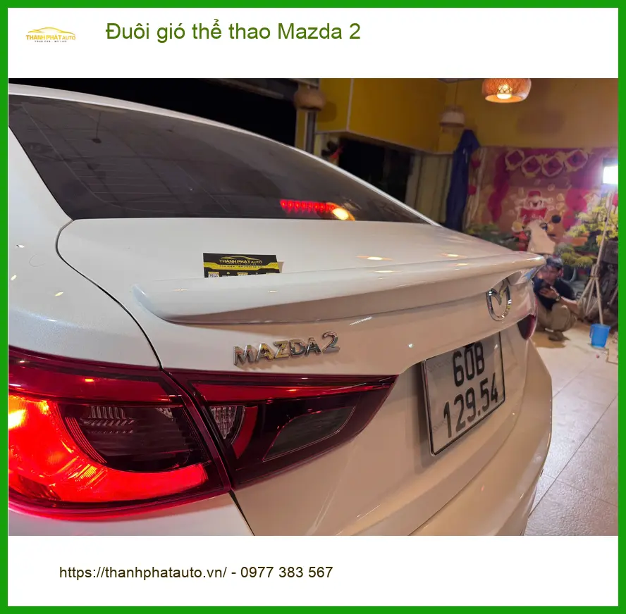 Chị Hoa lắp đuôi gió thể thao cho Mazda 2 tại Quận 5 tăng vẻ mạnh mẽ ảnh thực tế 5