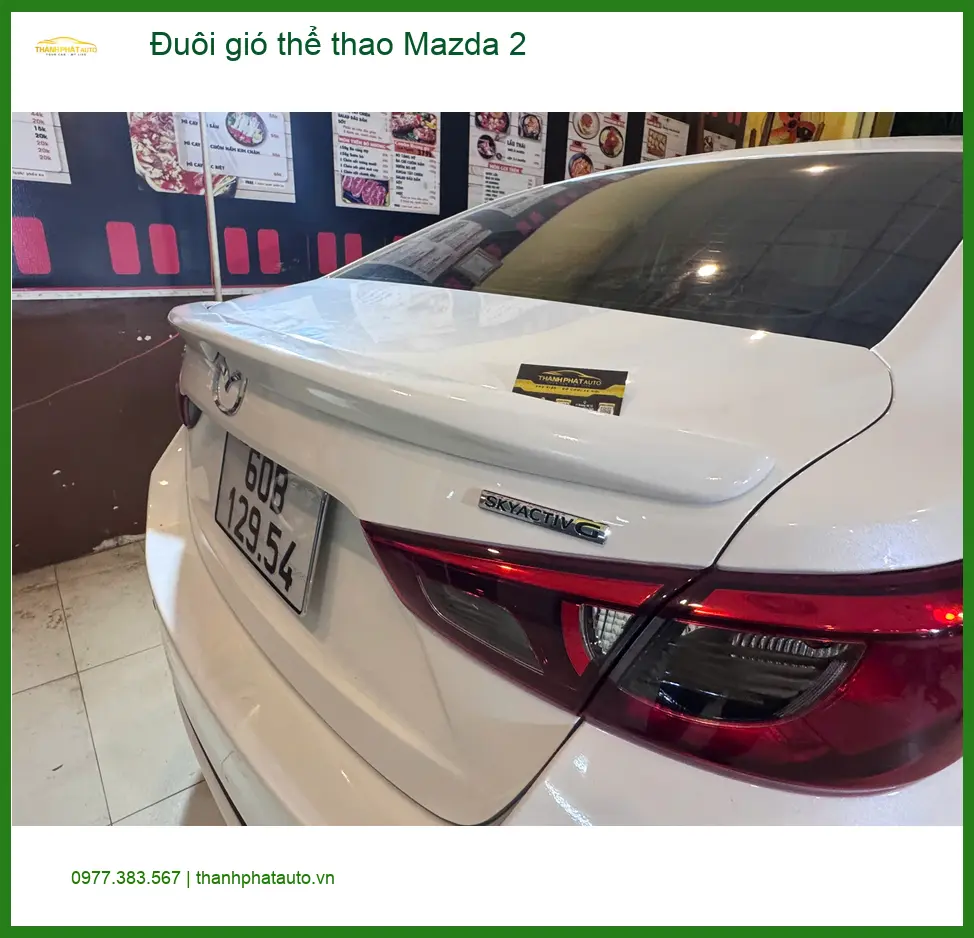 Anh Khải gắn đuôi gió thể thao Mazda 2 tại Phú Nhuận cho xe cá tính hơn ảnh thực tế 2