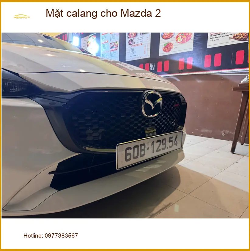 Anh Khải độ mặt calang cho Mazda 2 tại Quận 5 để xe có diện mạo mới