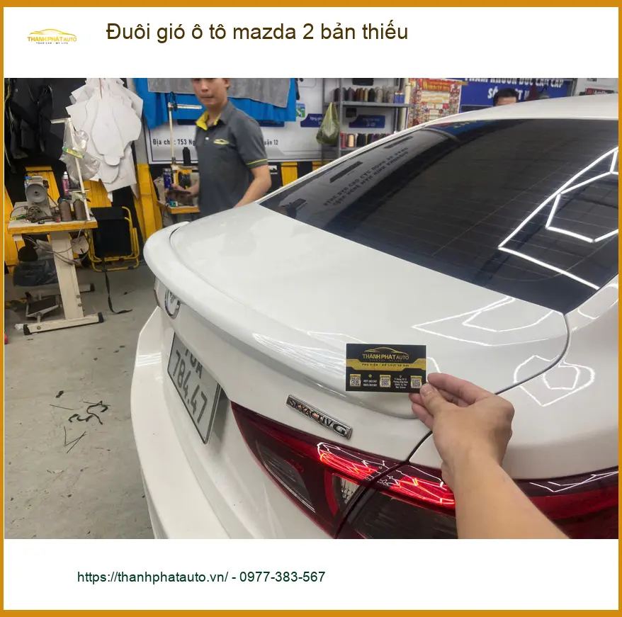 Anh Quang lắp đuôi gió ô tô Mazda 2 bản thiếu ở Quận 4 tăng vẻ thể thao ảnh thực tế 2